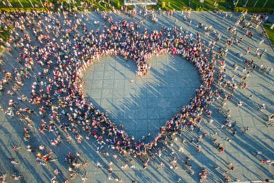 Drone,View,Of,Women,Who,Formed,A,Huge,Heart,Shape